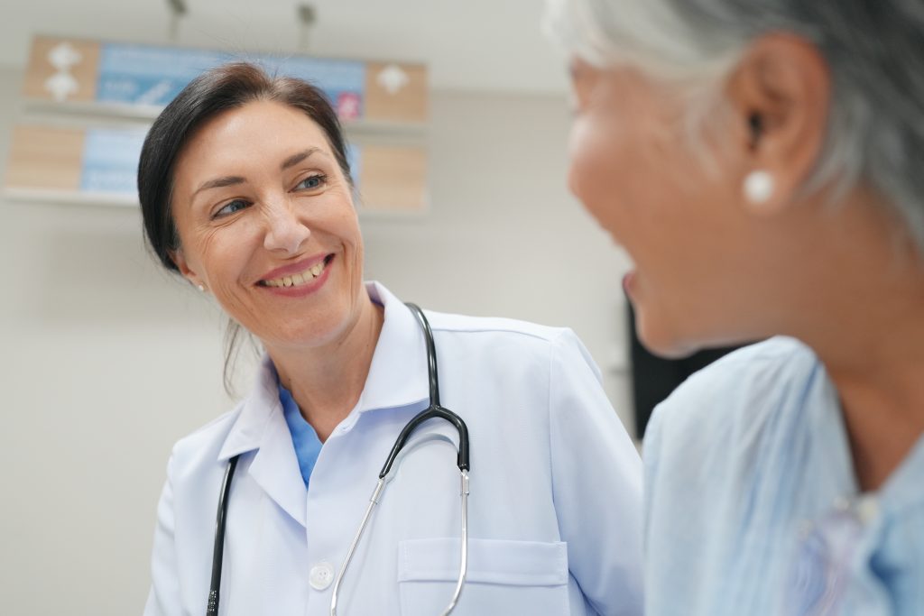 Docto0r talking about care path with patient.